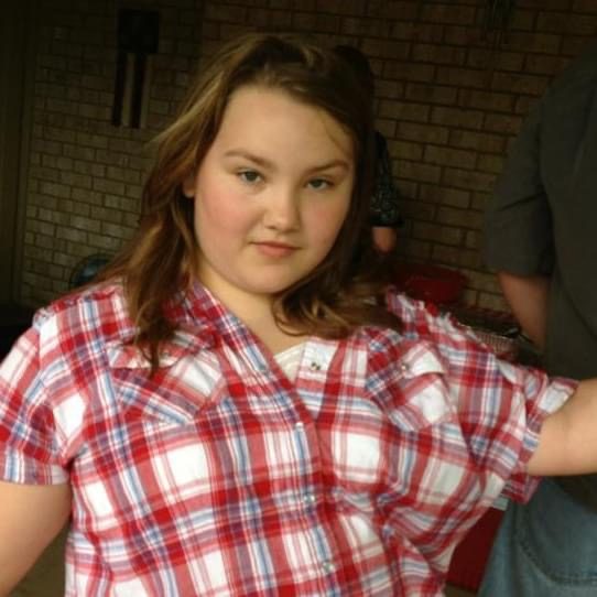 Marissa in a red plaid shirt